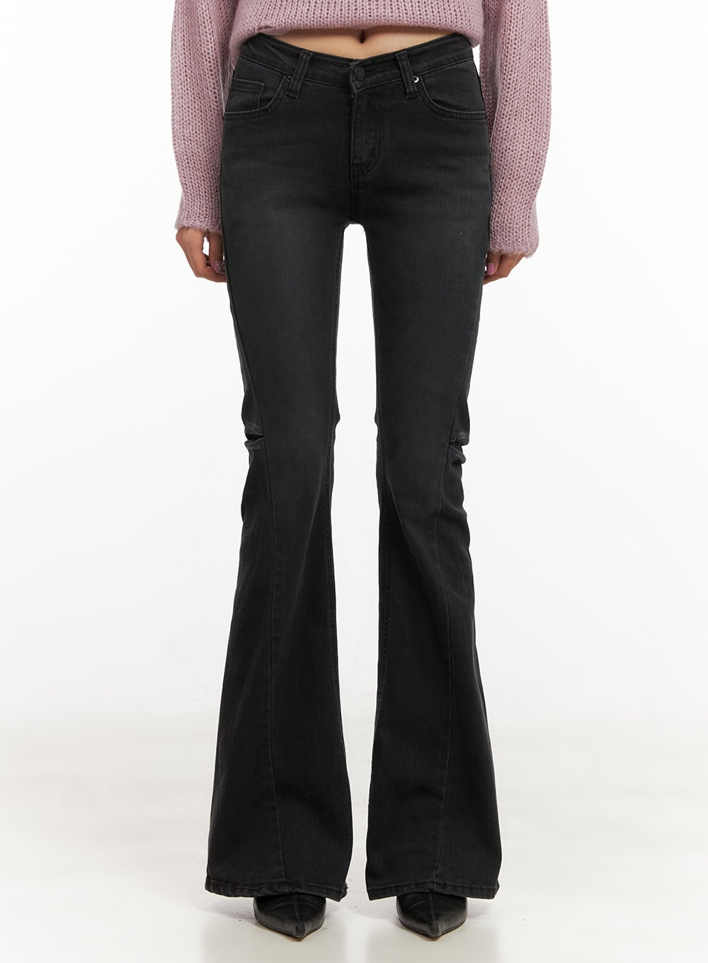 LEWKIN Belle Slim Fit Flared Jeans CD410 in black, front view on model, low-waist washed denim with slim thigh and wide flared hem, styled with pink knit sweater and black heels.
