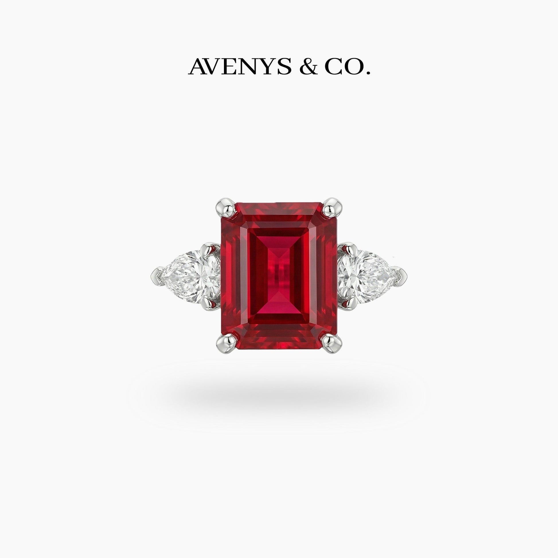 Emerald Pear Trilogy Ring with Red Emerald Stone – on White Gold