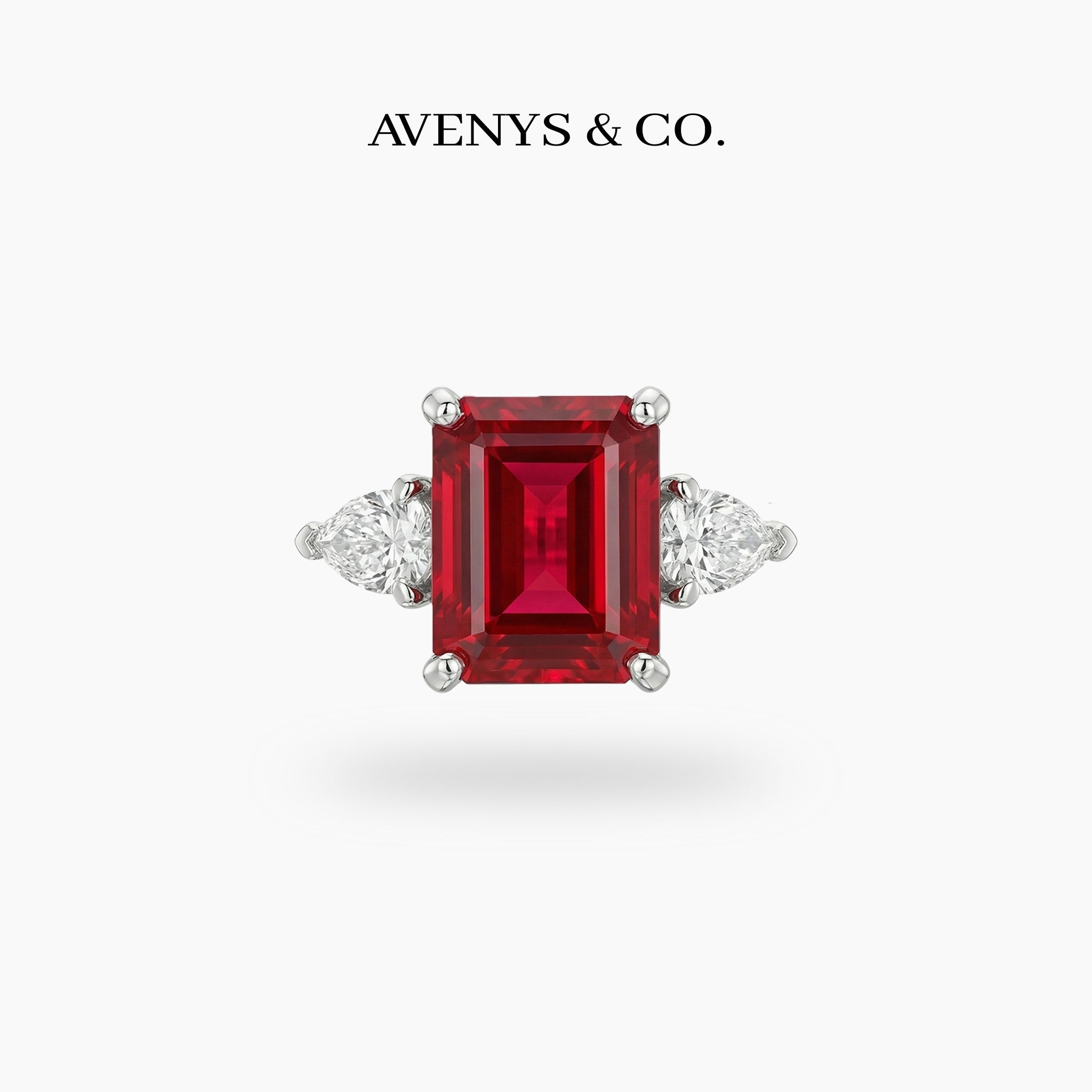 Emerald Pear Trilogy Ring with Red Emerald Stone – on White Gold