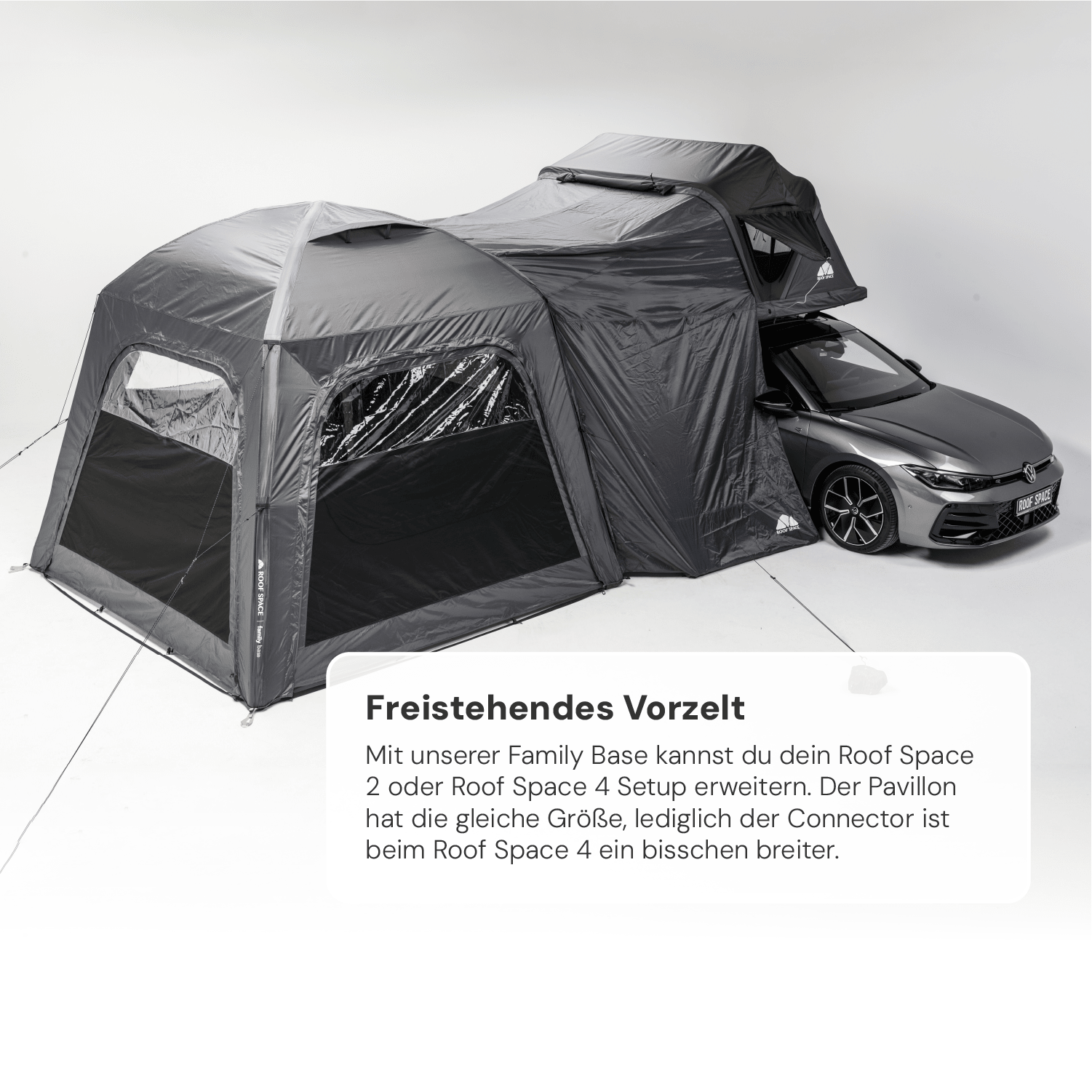 Graues freistehendes Vorzelt verbunden mit einem grauen Dachzelt auf einem PKW vor weißem Hintergrund. Text "Freistehendes Vorzelt" und "ROOF SPACE" sichtbar.