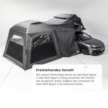 Graues freistehendes Vorzelt verbunden mit einem grauen Dachzelt auf einem PKW vor weißem Hintergrund. Text "Freistehendes Vorzelt" und "ROOF SPACE" sichtbar.