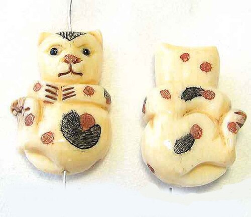 Scrimshawed Calico Hand Carved Kitty Cat Waterbuffalo Bone Bead 4830B | 27.5x15x10mm | Cream, Black and Red - PremiumBead Primary Image 1