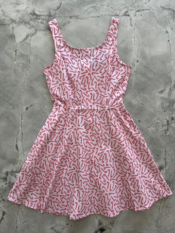 flatlay of candy cane skater dress