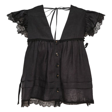 Ganni Light Linen Angel Sleeve Blouse in black, featuring lace-trimmed flutter sleeves, button-front gathered bodice, and open tie-back neckline