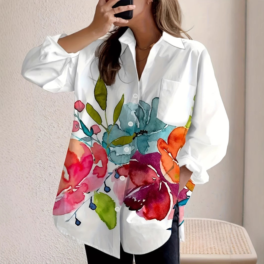 Women's white button-up blouse with vibrant watercolor floral print in coral, pink, and teal