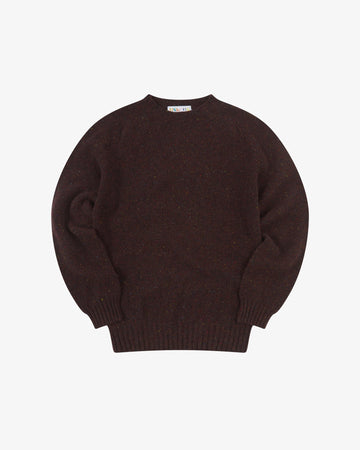 Front flat view of brown speckled walnut, Alderney crew neck jumper in Scottish new wool. Clear view of drop shoulder design Uskees branding label.