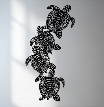 Delicate organic forms compose these sea turtle metal wall art, presenting a tribal ocean design that offers unique metal wall art with interwoven shapes.