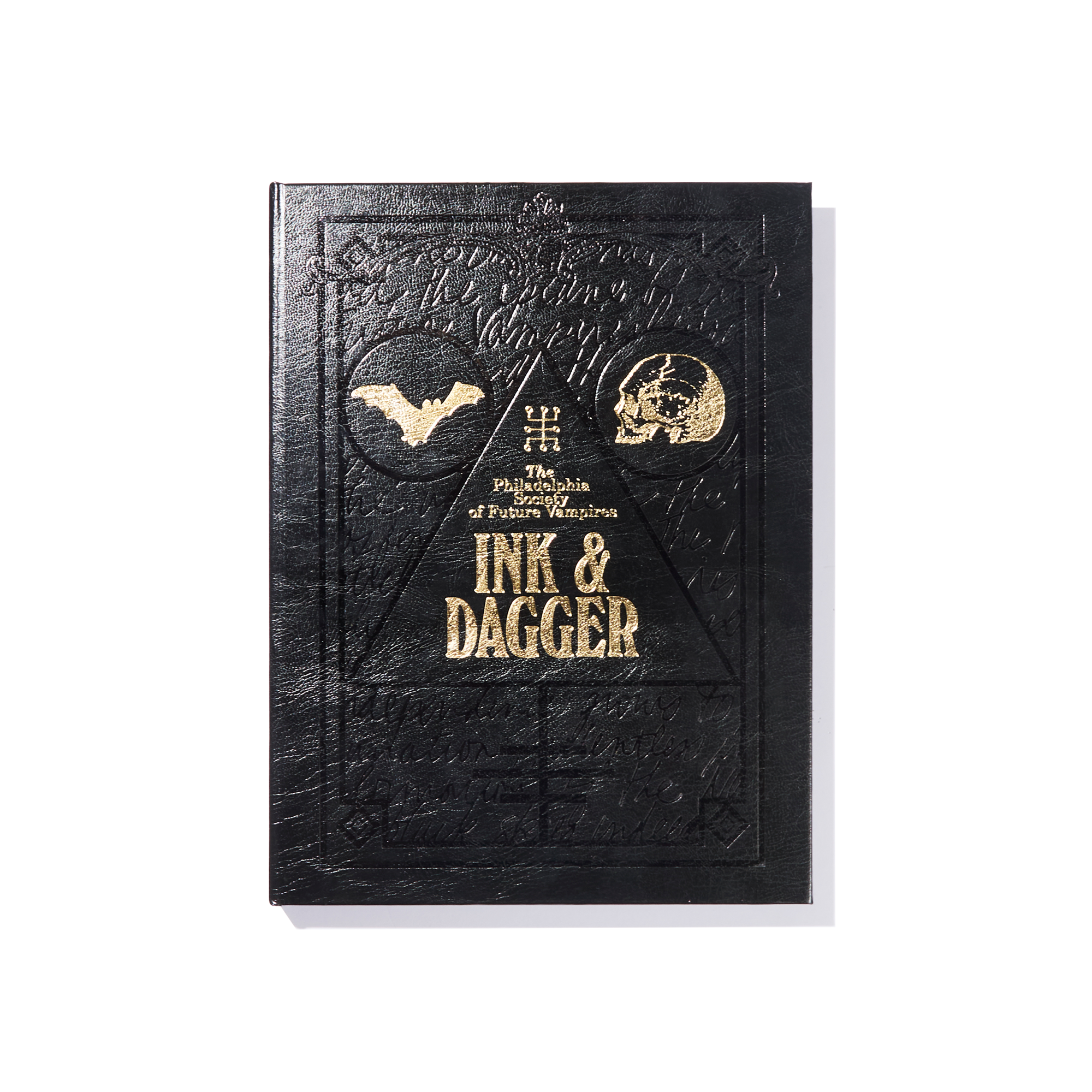 A black embossed book cover with gold text reading The Philadelphia Ed. of Future Weapons by Ink & Dagger, featuring a bat, a skull, and geometric designs—this limited edition volume from Ink & Dagger is truly The Almighty book for collectors and fans alike.