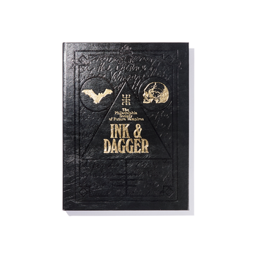 A black embossed book cover with gold text reading The Philadelphia Ed. of Future Weapons by Ink & Dagger, featuring a bat, a skull, and geometric designs—this limited edition volume from Ink & Dagger is truly The Almighty book for collectors and fans alike.
