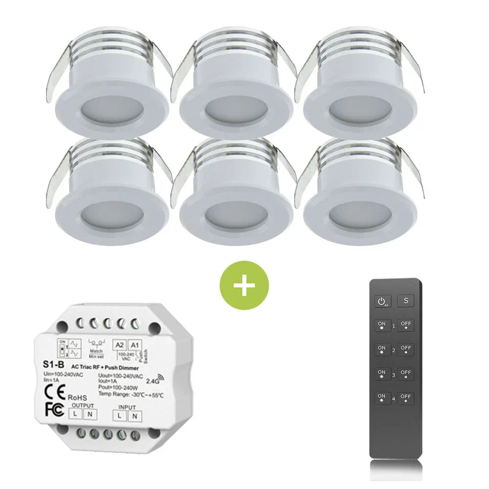 Set van 6 ronde LED mini inbouwspots met witte rand, inclusief draadloze afstandsbediening en dimmodule, vooraanzicht van de spots en accessoires.