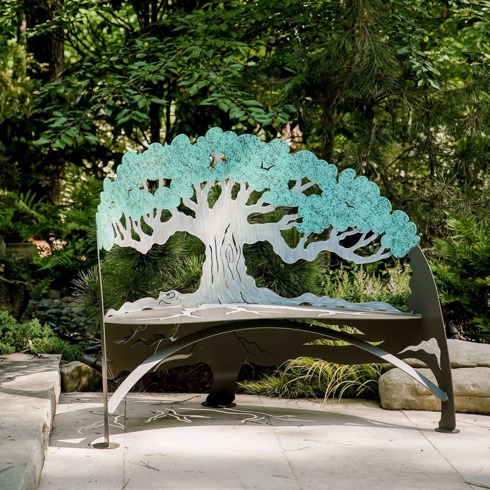 tree bench outdoor garden bench with tree silhouette metal bench sculptural tree design park bench in landscaped garden