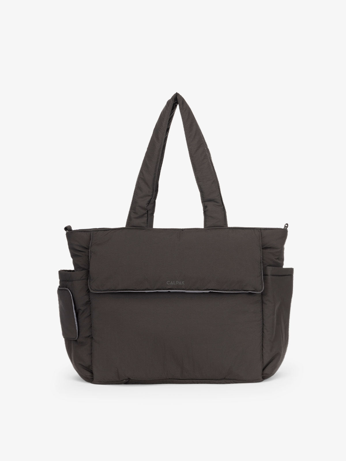 CALPAK Diaper Tote Bag with Laptop Sleeve made with durable, recycled, water-resistant material and a magnetic front pocket closure in black; TBB2401-BLACK