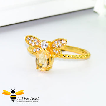 Sterling silver 14k Gold plated bee ring featuring an Oval Citrine gemstone and diamond like cubic zircon crystals.