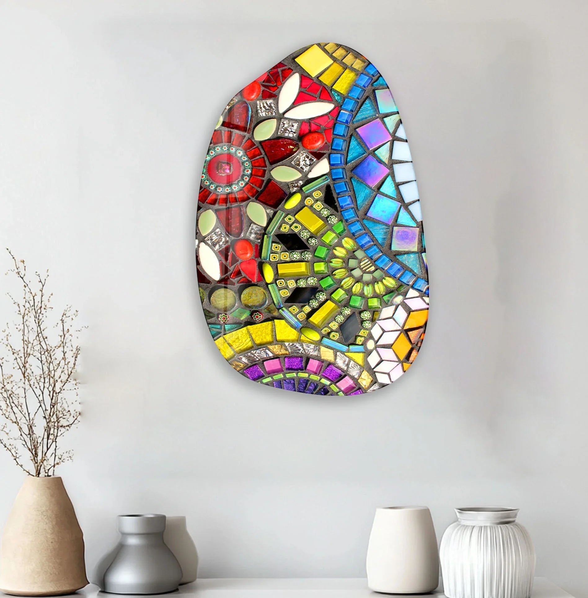 An abstract glass art painting with bold geometric patterns and vibrant colors uses ample negative space to create a striking, modern focal point.