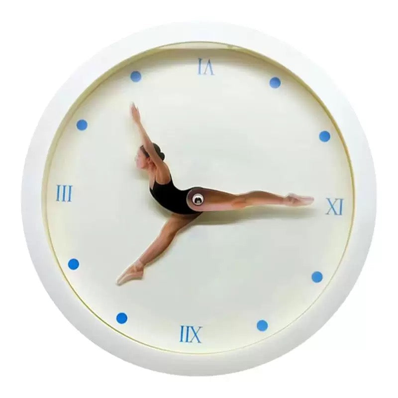 Wall clock with a graphic of a dancer in a pose on a white background