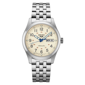 A silver SEIKO 5 Sports watch with a cream dial, blue and red accents, and luminous hands and markers. It includes a date display and a screwdown see-through caseback.