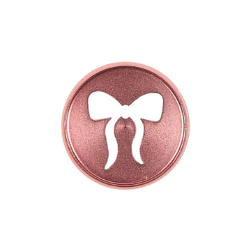Pink Bow Cutout - Medium Metal Disc Set featuring a shiny rose pink metal disc with a bow-shaped cutout, designed for use with disc bound planners and journals.