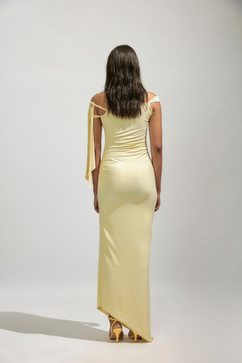 Deme By Gabriella YVETTE butter yellow maxi dress with flowing fabric and sleeveless design, full-length style for elegant summer wear.