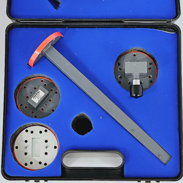Anritsu WR137M waveguide calibration kit open case showing 26UM70 load, 23UM70 offset short, 24UM70 offset short, and 35UM70N coaxial adapter in blue foam