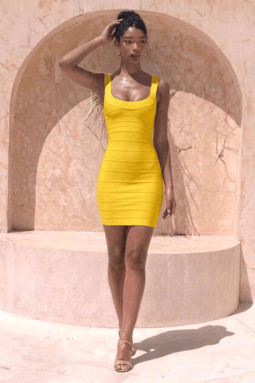 Woman wearing a figure flattering  Cindy Bandage Mini Dress - Mustard Yellow BODYCON COLLECTION Pty Ltd
