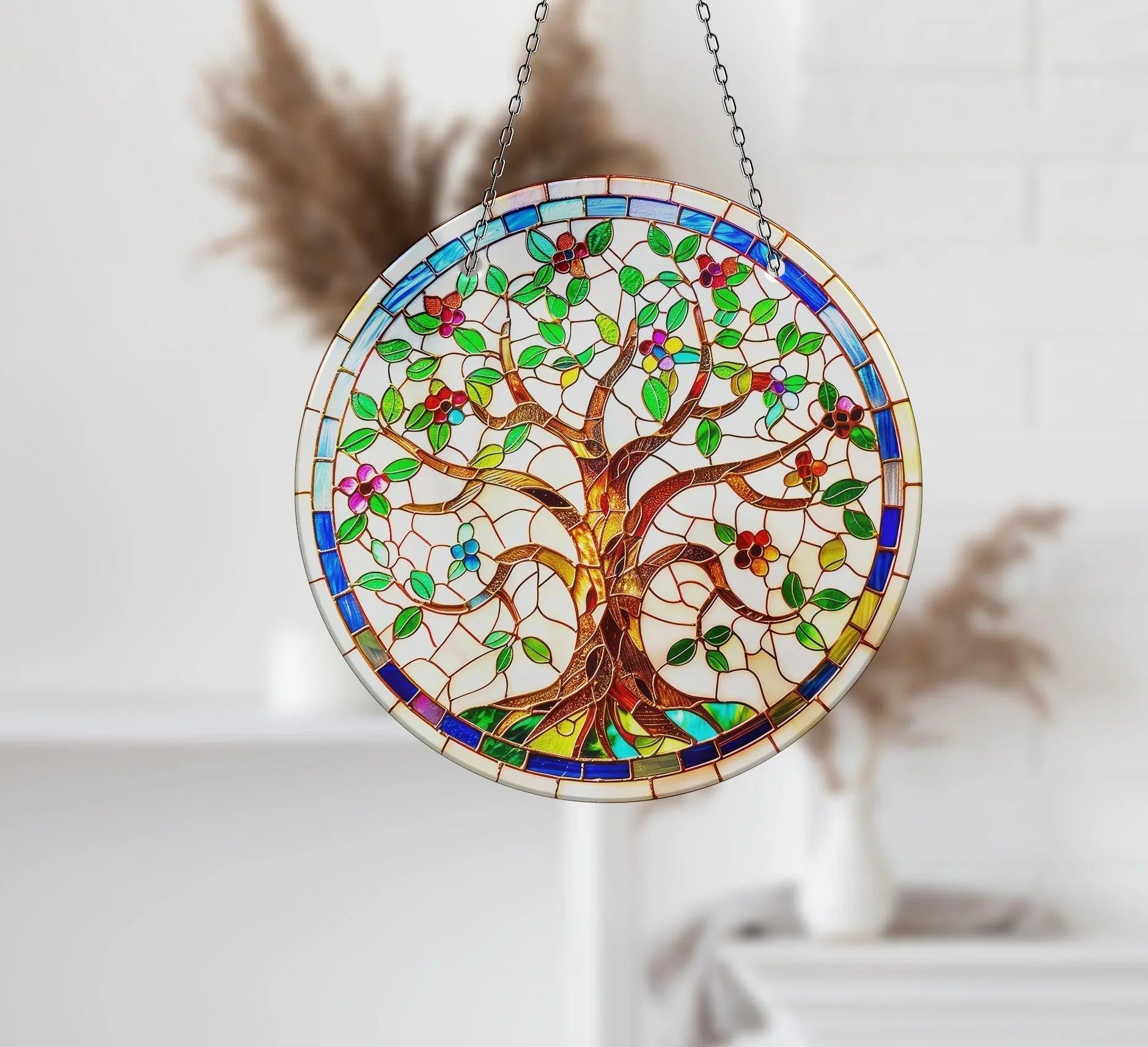 The central subject is a tree of life design in a colorful stained glass wall art decor suncatcher, featuring detailed branches, leaves, and flowers.