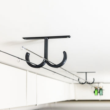 The Fishing Rod Holder Double Ceiling by Pesca Innovations allows you to store any of your fishing rods on a ceiling.