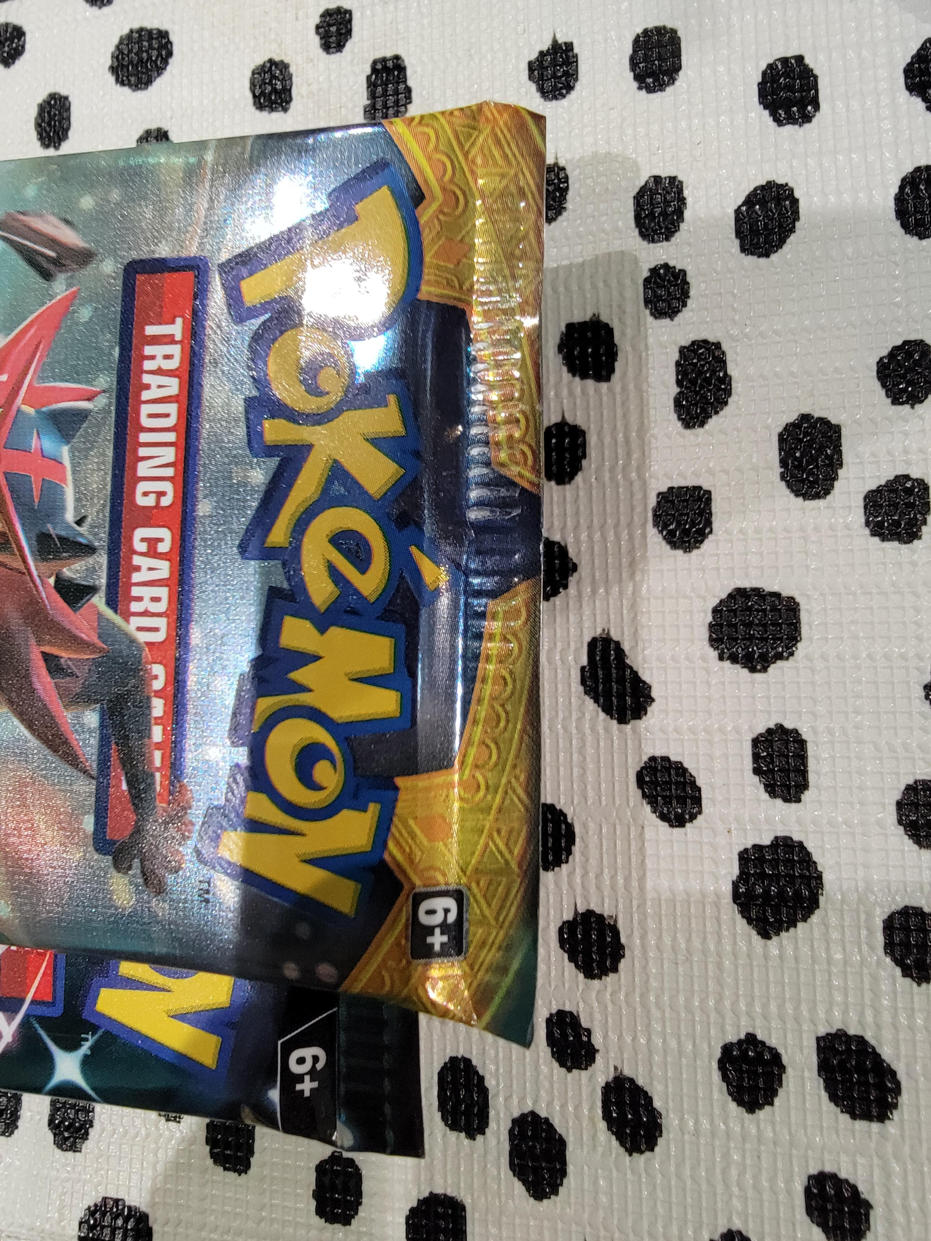 Have these Pokémon booster packs been resealed? : r/IsMyPokemonCardFake