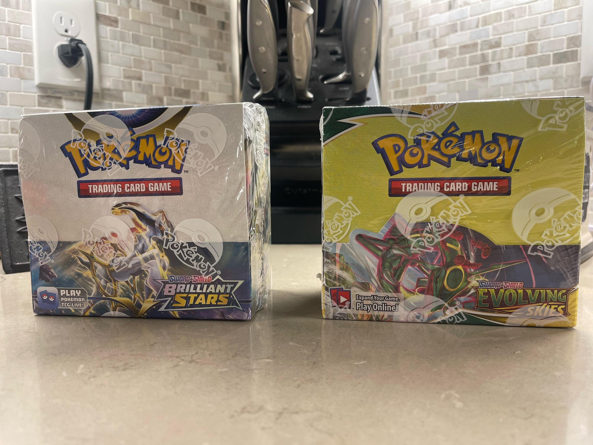 How do i tell if booster box been resealed? I can feel the white poke balls on B stars pack but not E skies. Is that normal? : r/pokemoncards