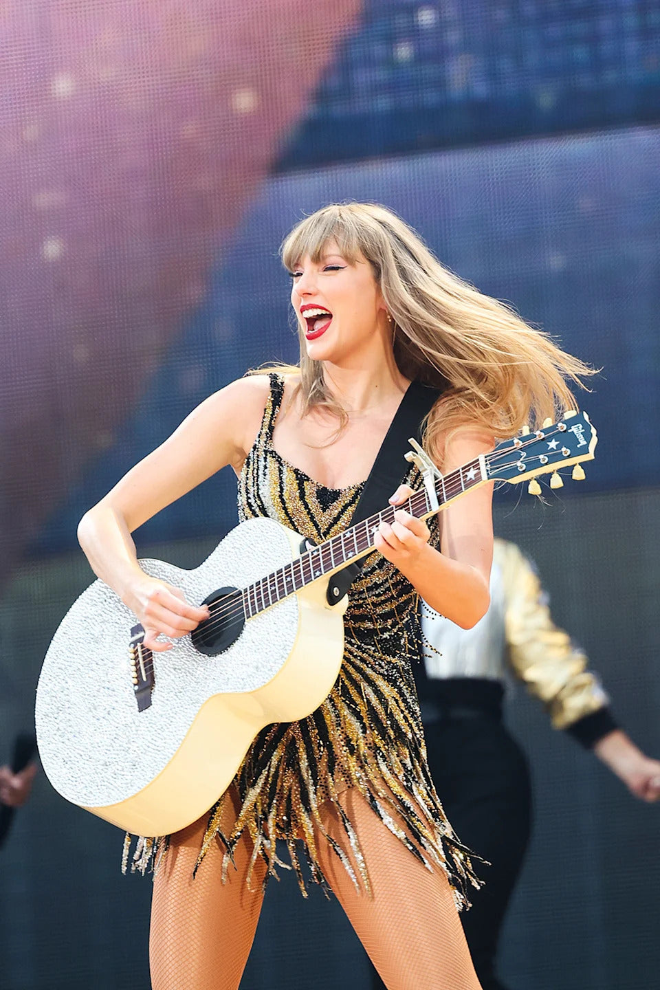 Taylor Swift Debuts Beaded Roberto Cavalli Dress with Fringe at Eras Tour Milan Show