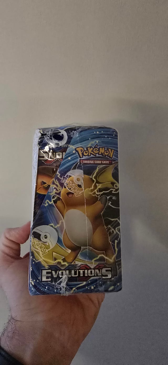 I just picked this XY Evolutions Booster Box up from my local newsagents. But is it real or fake? : r/IsMyPokemonCardFake