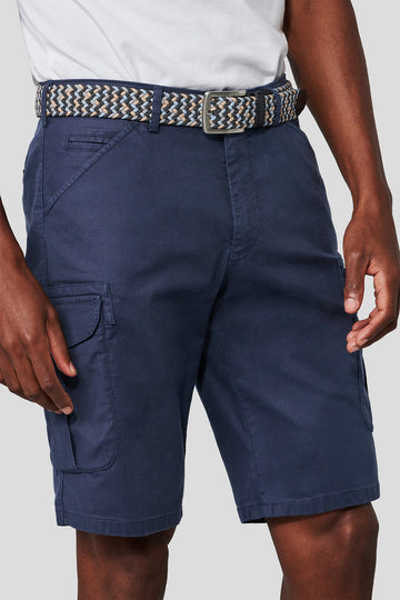 Navy cargo shorts with a belt on a plain background