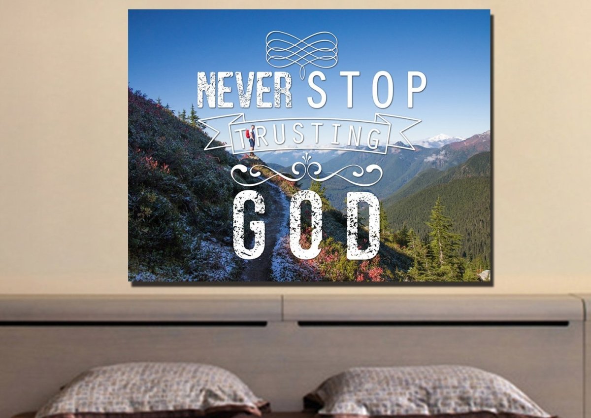 Canvas wall art with a hiker on a mountain trail and Never Stop Trusting God text in 1 Panel and 40x30" size