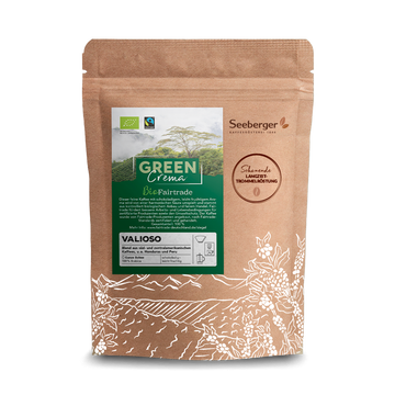 Eine braune Kaffeeverpackung mit grünem Label beschreibt Fairtrade-Bio-Kaffee von Seeberger.