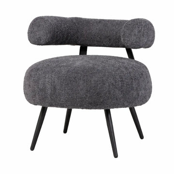 Poltrona Teddy in tessuto bouclé grigio con seduta arrotondata e schienale cilindrico design moderno