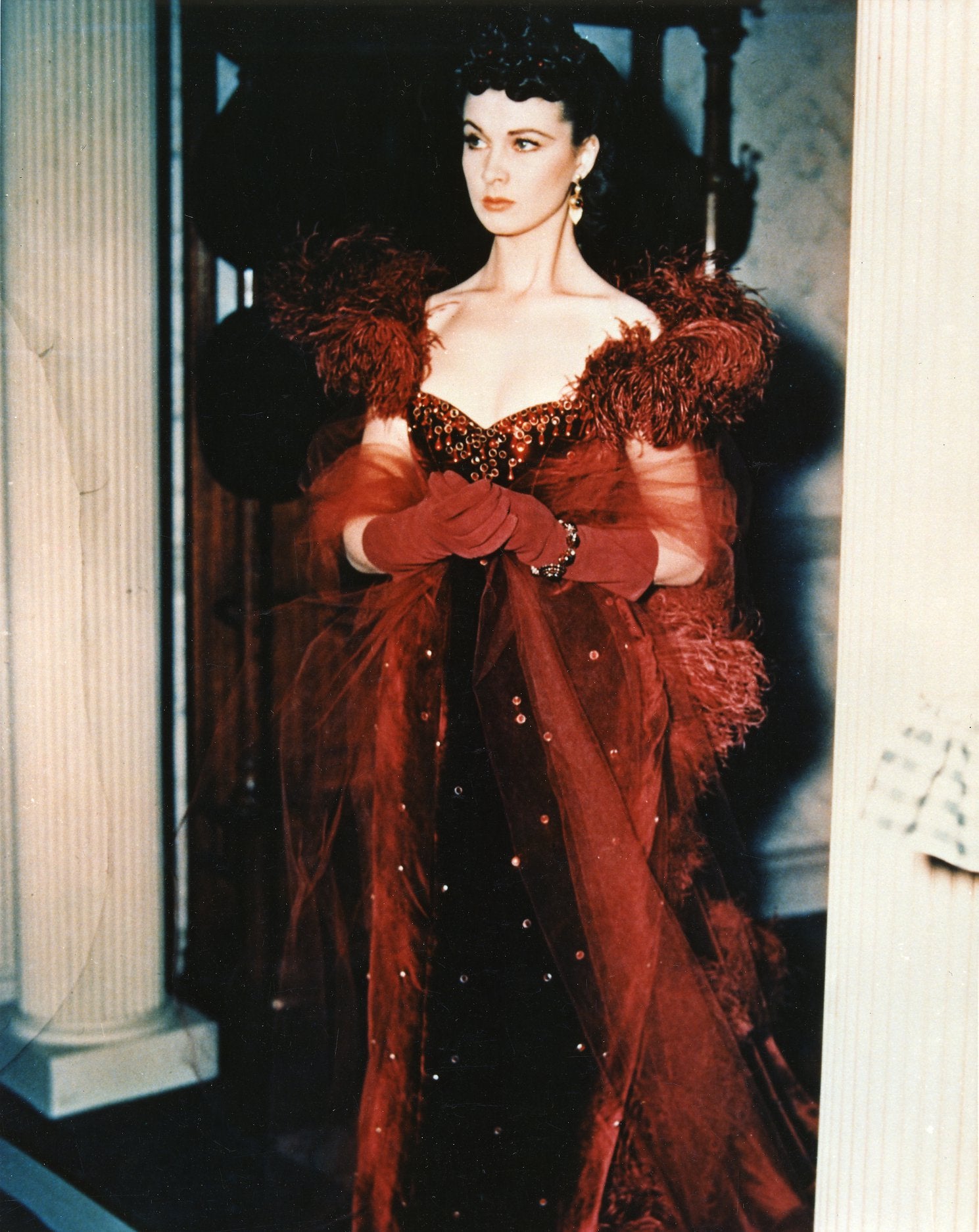 The "red dress" from Gone With the wind used by Scartlet O'Hara (Vivien Leigh), 1939. Designed by Walter Plunkett, Silk velvet red, with red face bead in the neckline and glass tear