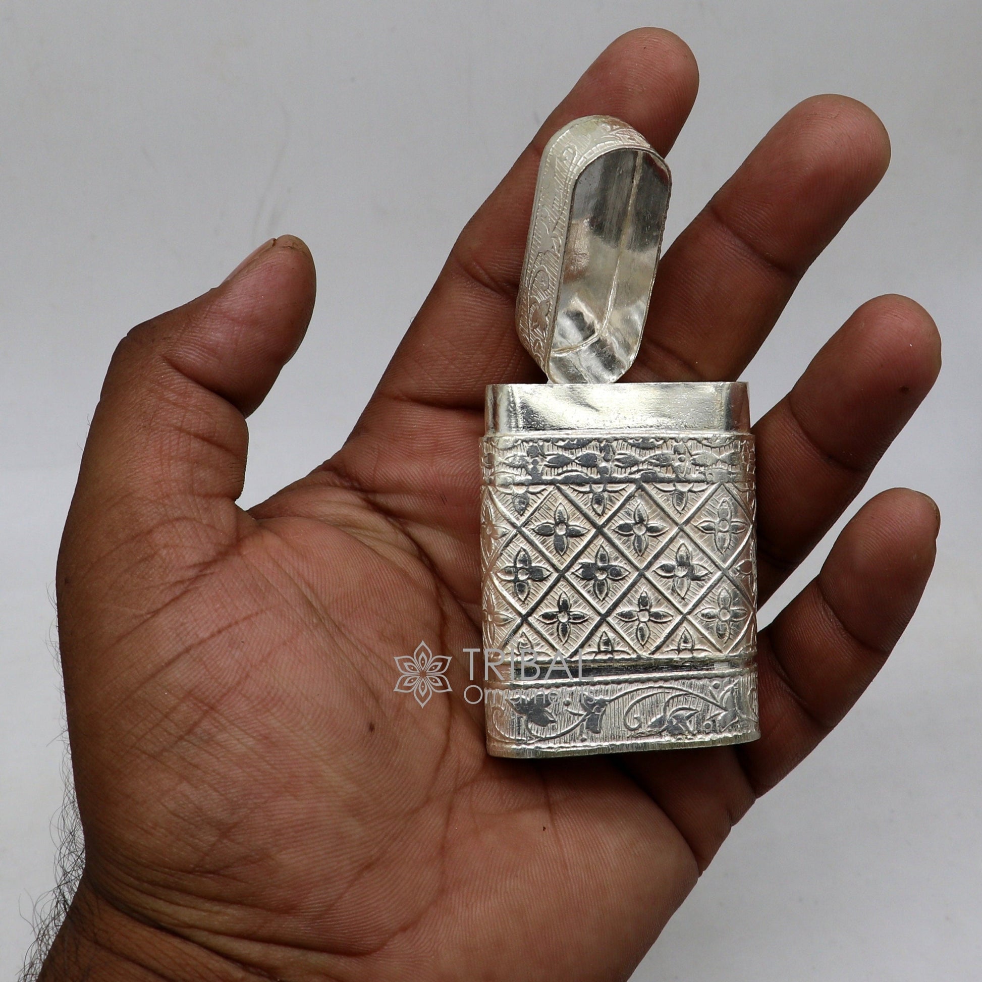 Sterling silver floral 2-in-1 royal trinket and tobacco box by TRIBAL ORNAMENTS, featuring intricate floral design.