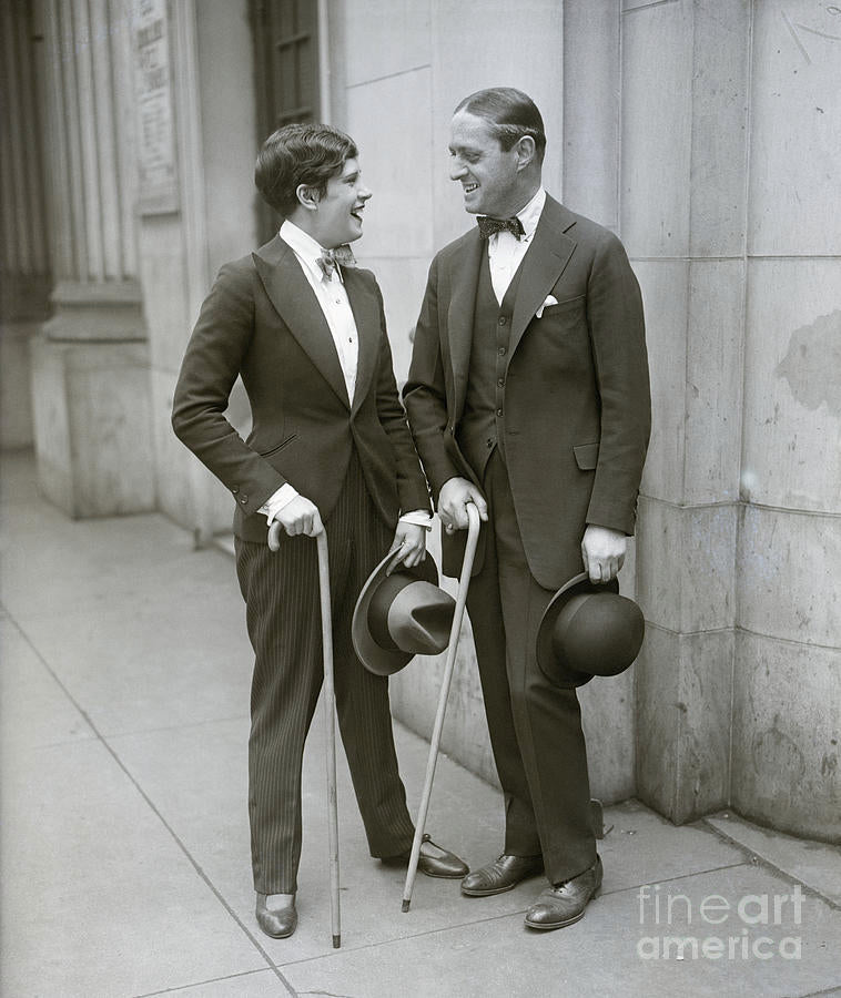 Woman Dressed Like Man Talks To Man by Bettmann