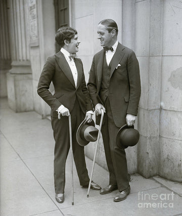 Woman Dressed Like Man Talks To Man by Bettmann