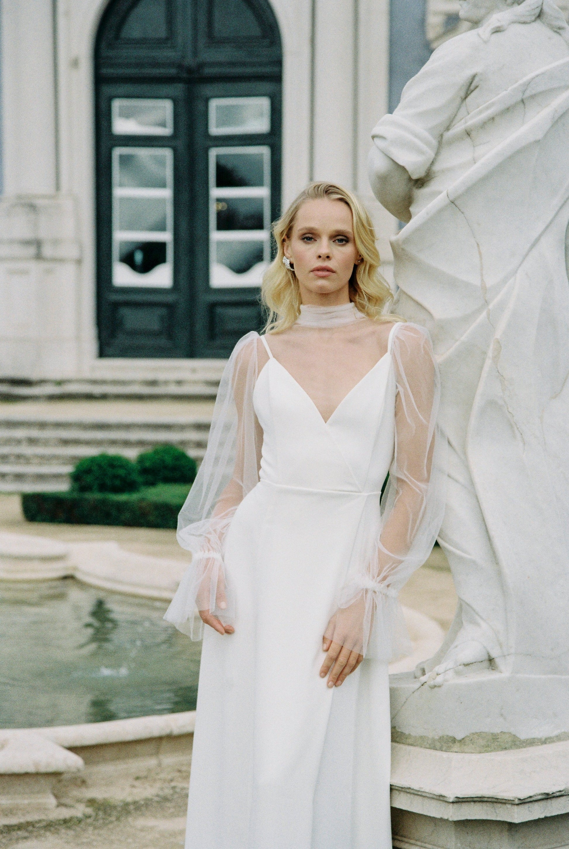 Slit wrap bridal dress with transparent mesh sleeves photo 1